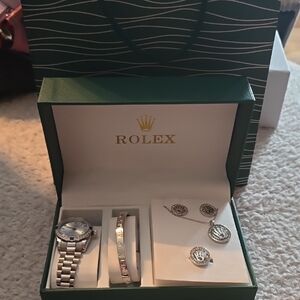 Rolx Silver Watch with Coordinated Silver Bracelet and Pendant Set
